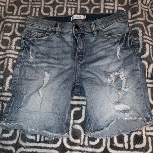 Ripped light blue shorts